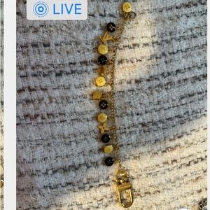 Gold and Black Charm Bracelet